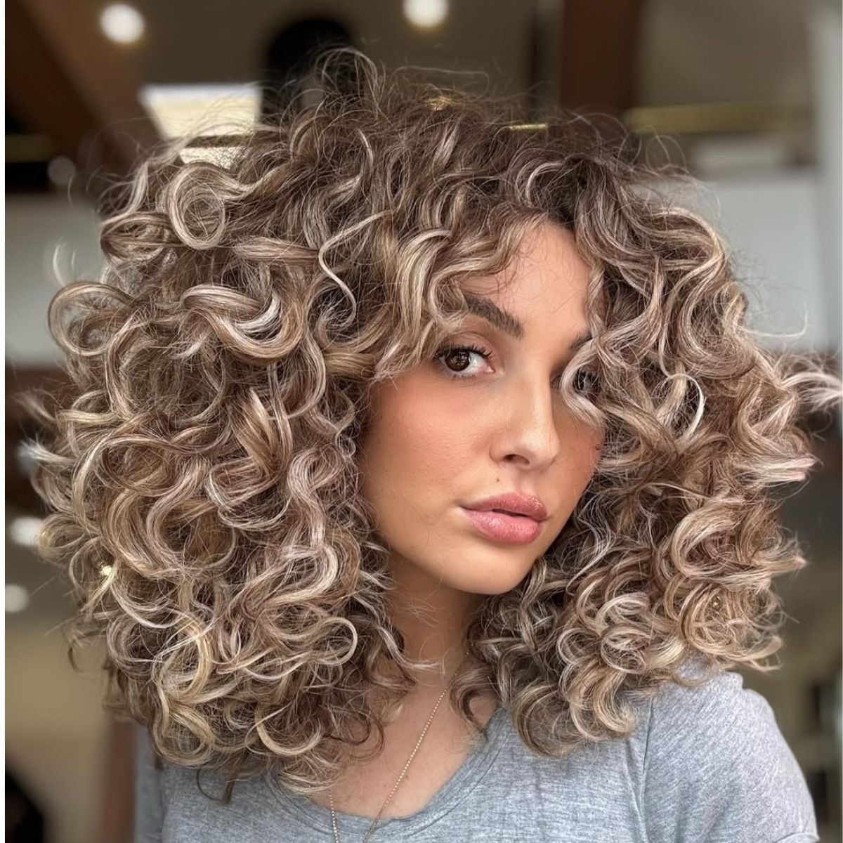 Rounded Collarbone Layers With Curtain Bangs — Curly Hair Cuts