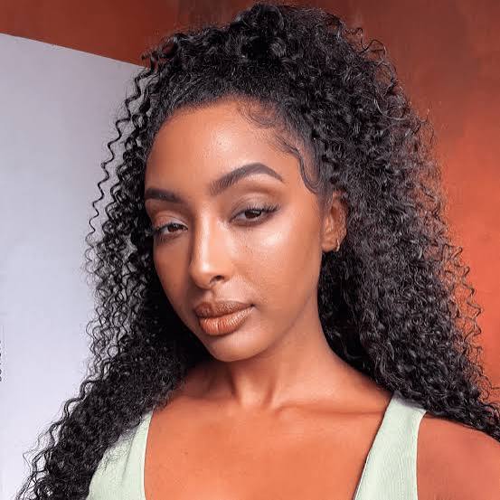 Mid-Back Dark Brown With Curtain Bangs — Curly Hair Down