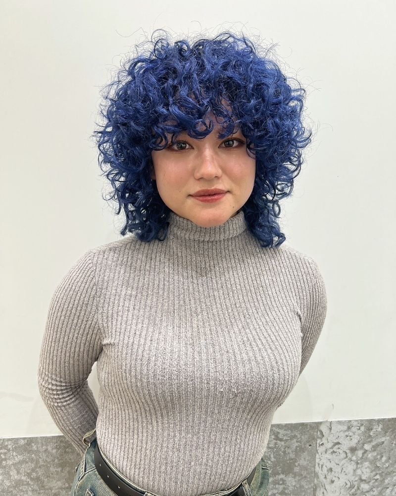 Collarbone Shag With Bright Blue Curls — Curly Hair Dye
