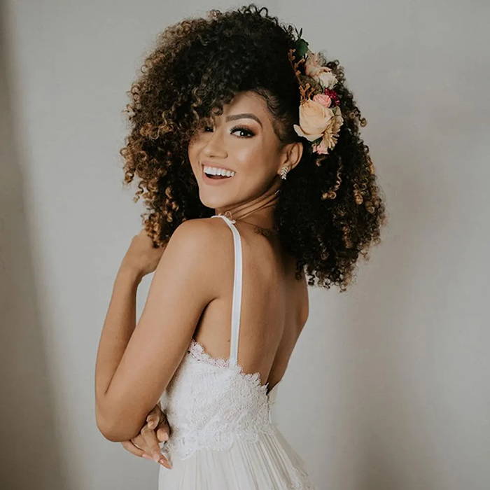 Dark Brown Updo With Fresh Flowers Dark Brown Updo With Fresh Flowers — Curly Hair Wedding