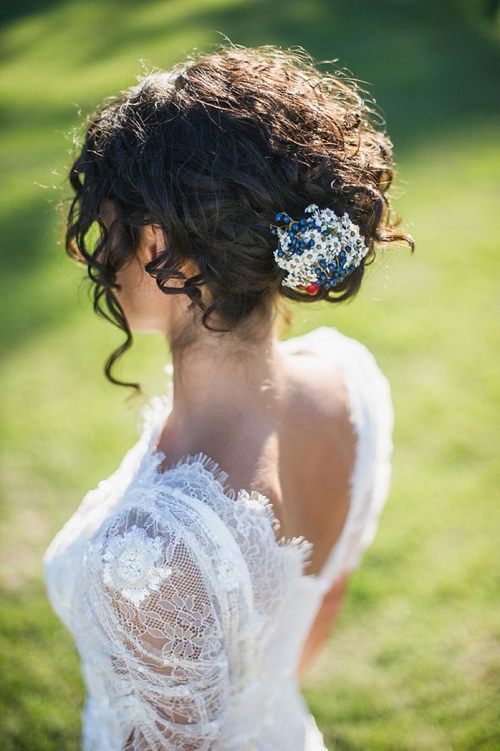 Mid-Back Braided Updo With Flowers Mid-Back Braided Updo With Flowers — Curly Hair Wedding