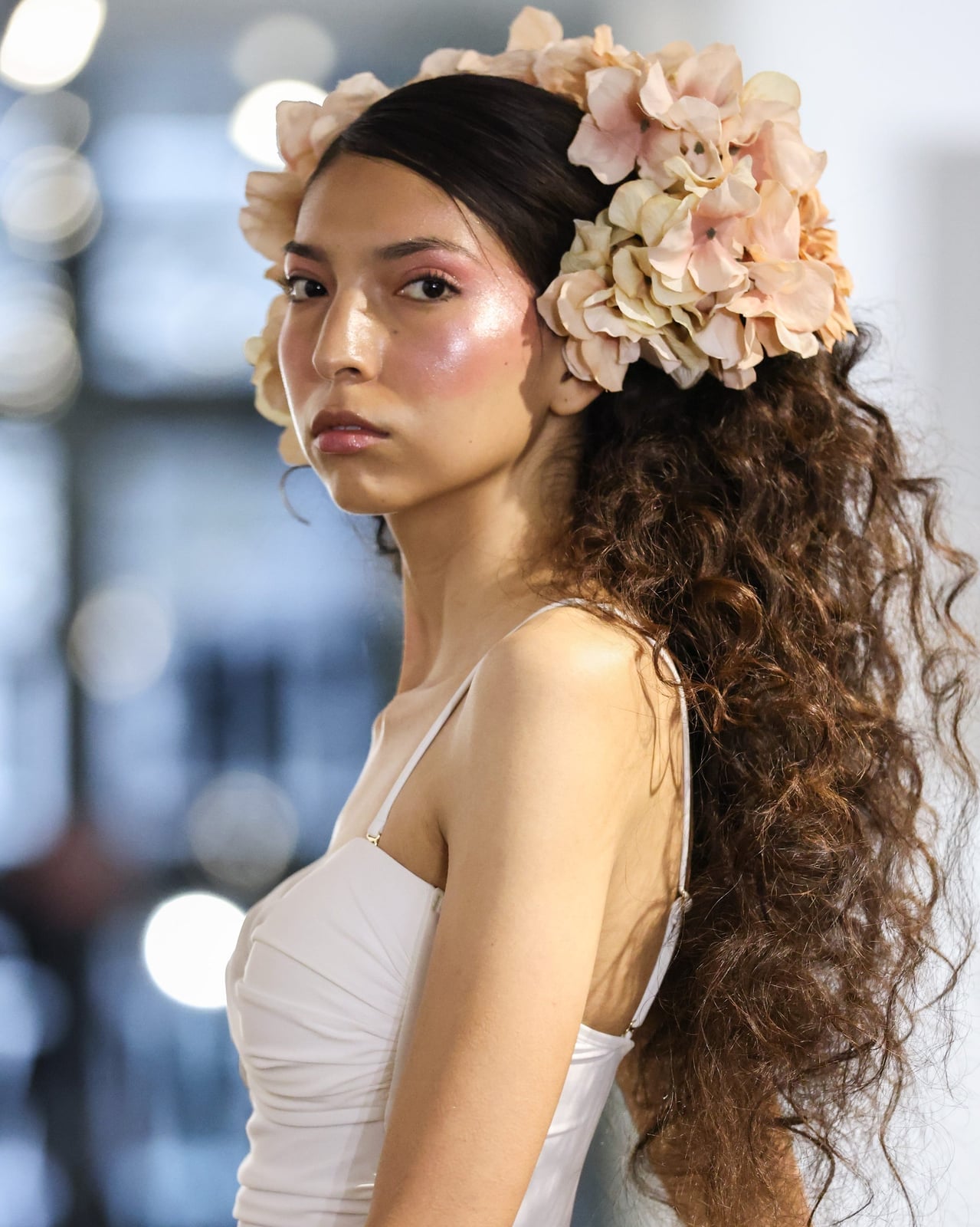 Mid-Back Updo With Large Floral Crown and A Woman With Thick Mid-Back Updo With Large Floral Crown and A Woman With Thick — Curly Hair Wedding