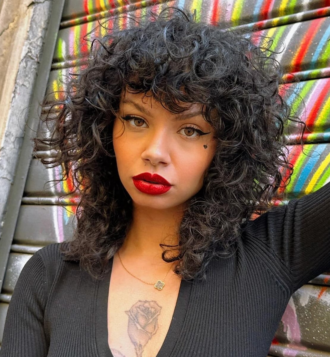 Shoulder Shag With Curtain Bangs and Highlights — Curly Shag
