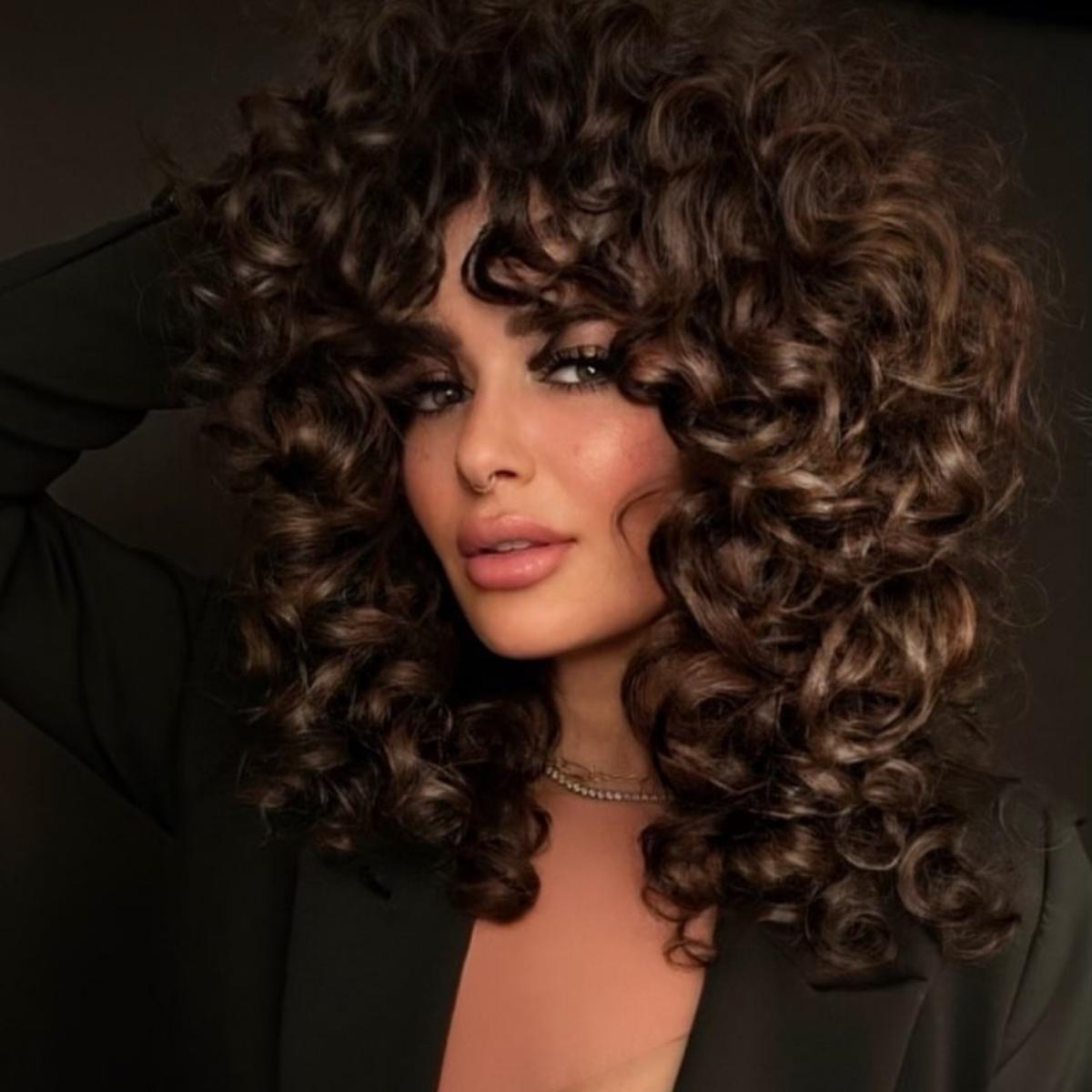 Shoulder Shag With Full Fringe and Volume — Curly Shag