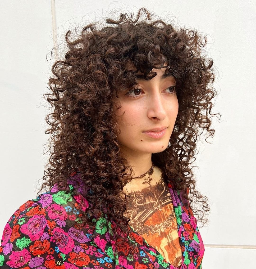 Collarbone Shag With Defined Spiral Curls — Curly Shag