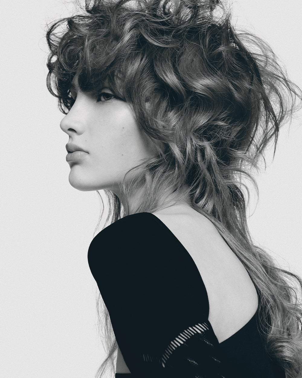 Mid-Back Auburn Curly Wolf Cut With Wispy Bangs