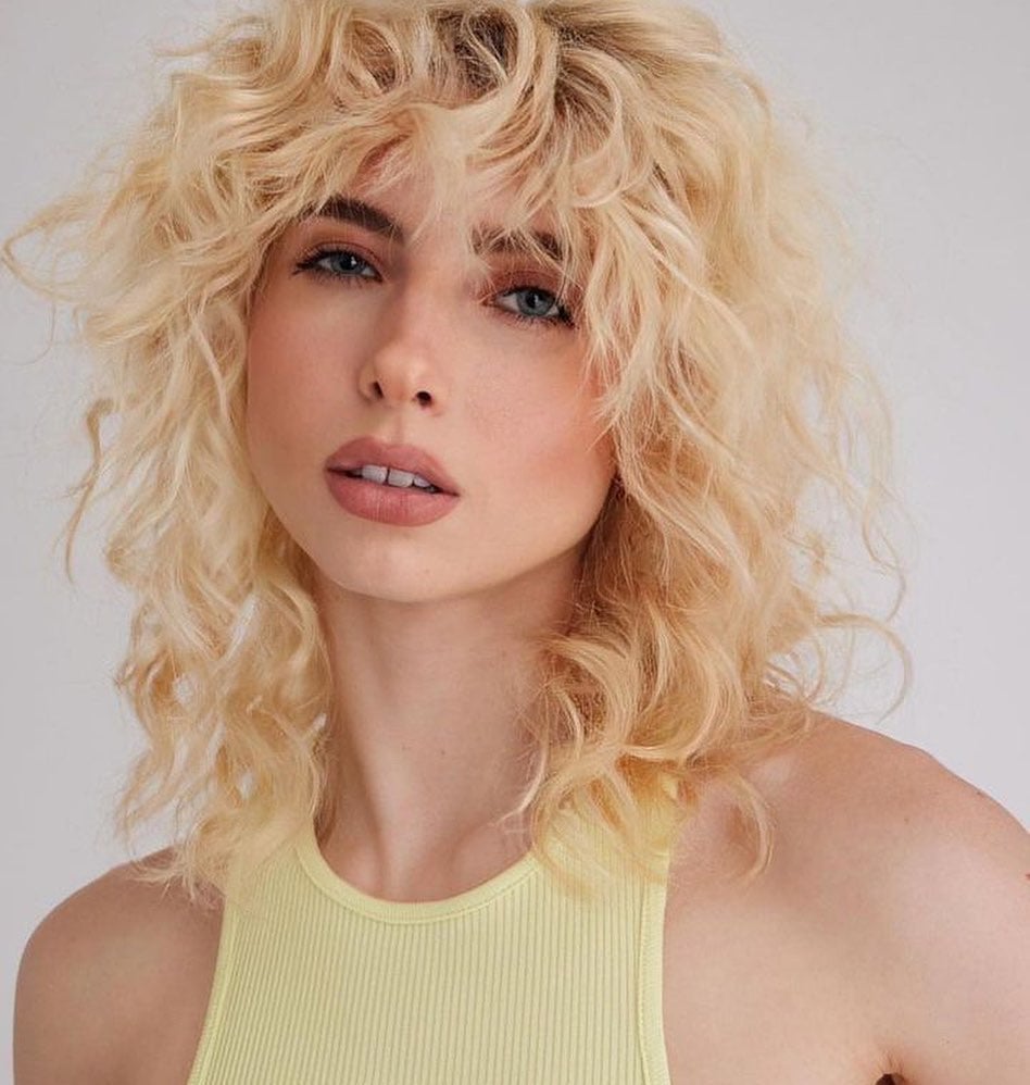 Collarbone Ash Blonde Wolf Cut With Shaggy Bangs — Curly Wolf Cut