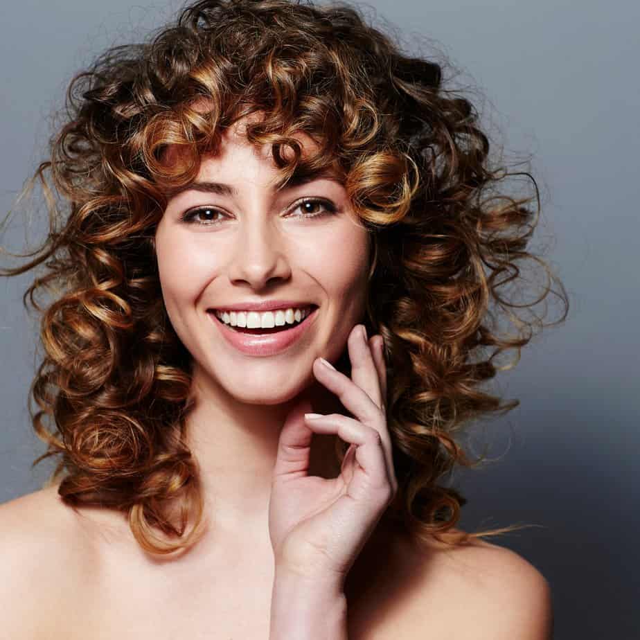Shoulder Length Honey Brown Wolf Cut With Auburn Undertones — Curly Wolf Cut