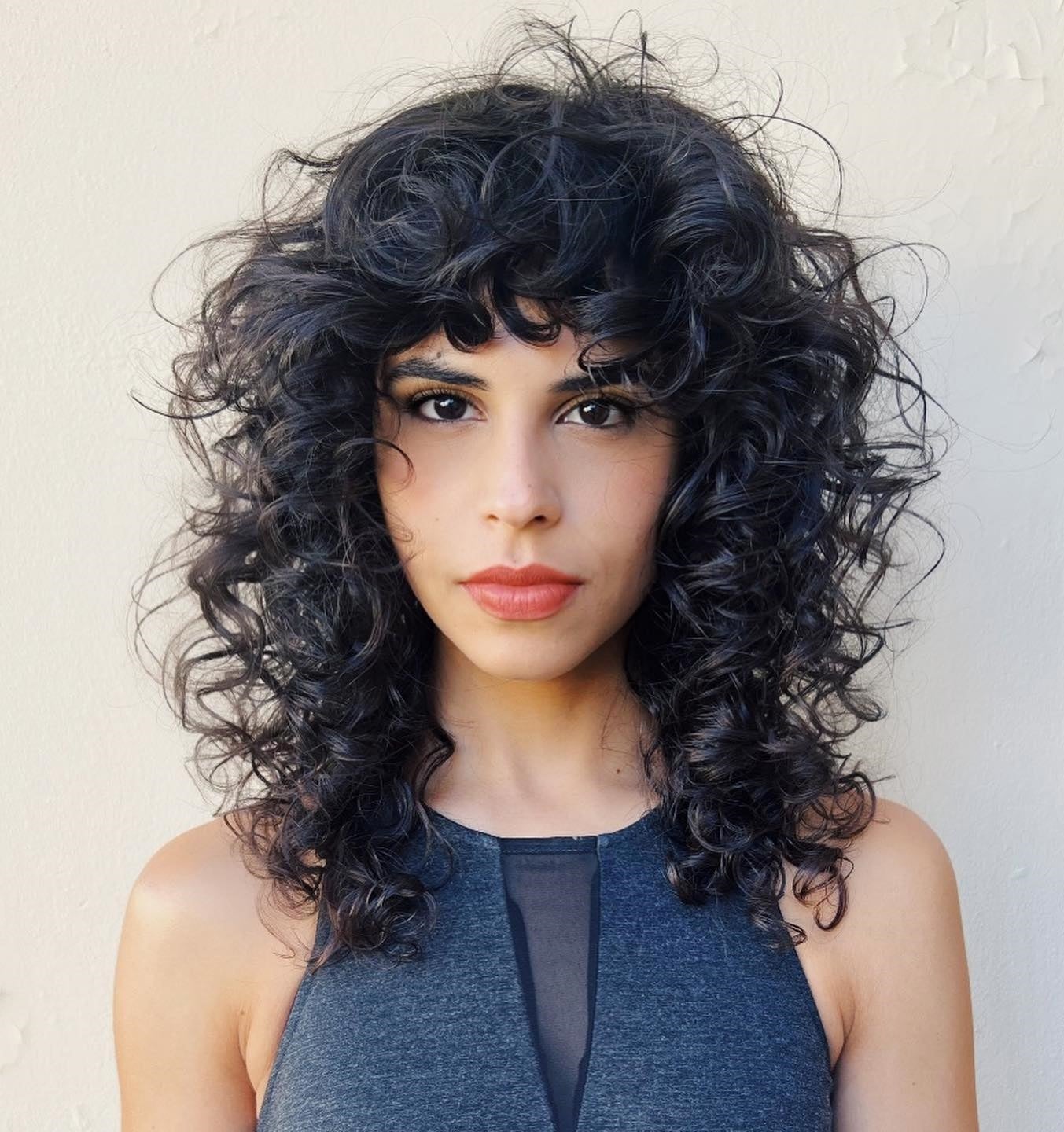 Collarbone Dark Brown Curly Wolf Cut With Full Bangs