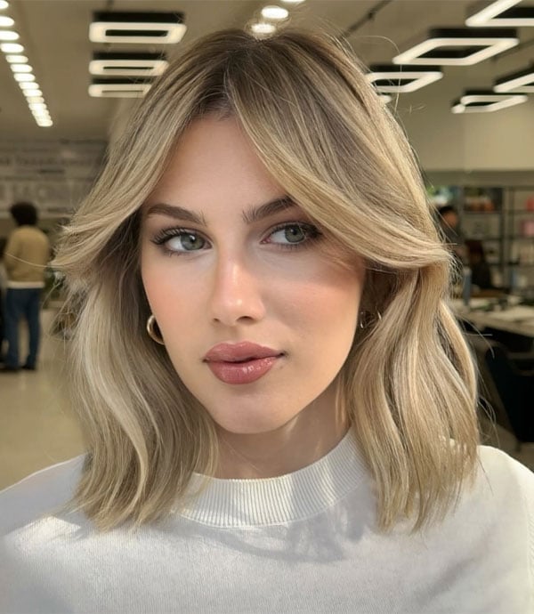 Platinum Blonde Mid-Back Waves With Bangs — Curtain Bangs with Layers