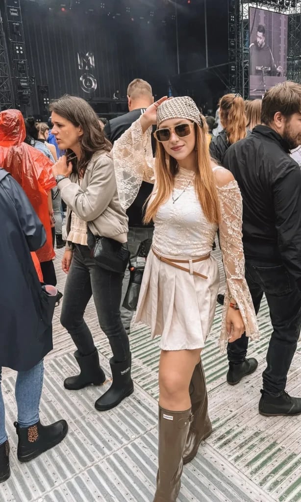 Lace Bell-Sleeve Top with Pleated Mini Skirt and Knee-High Boots — Cute Concert Outfit
