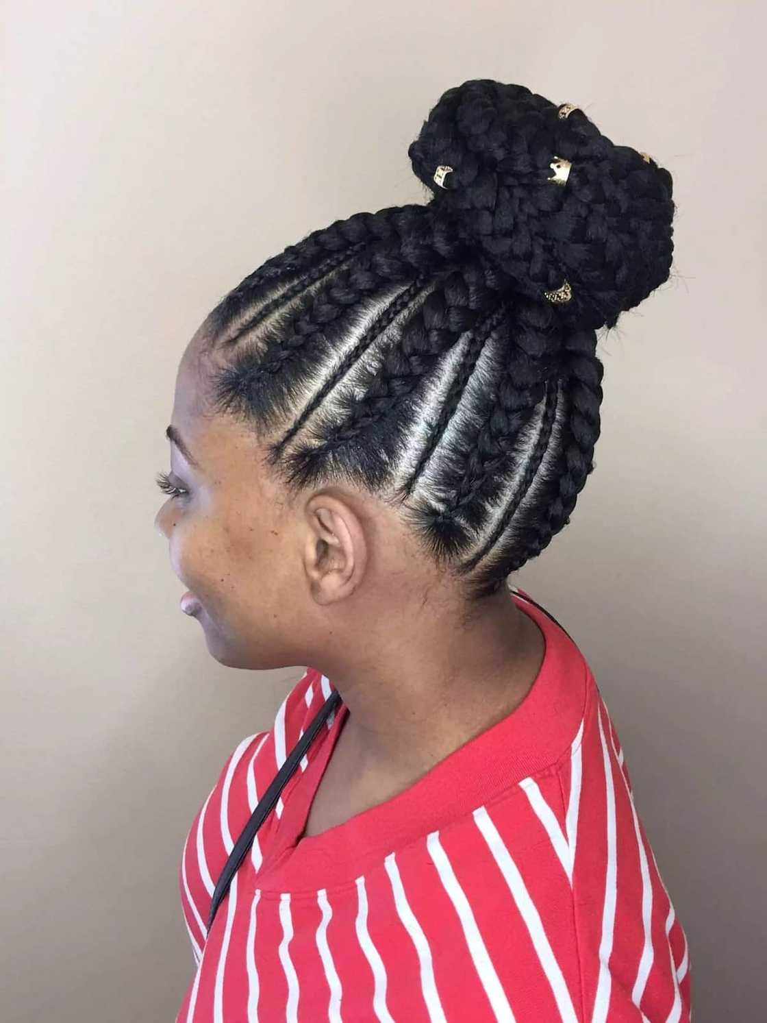 Thick Black Cornrow Bun With Gold Accessories — Dance Hair