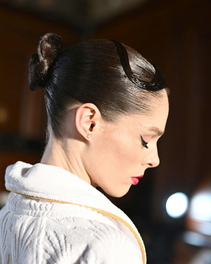 Slicked Back Bun With Spiky Flyaways Slicked Back Bun With Spiky Flyaways — Dance Hairstyles