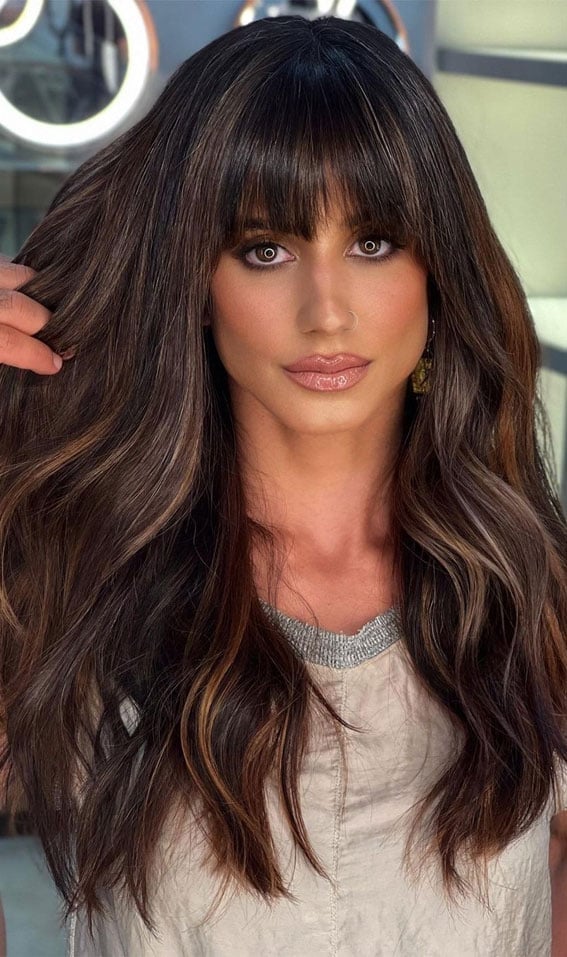 Mid-Back Waves With Toffee Highlights and Full Fringe Mid-Back Waves With Toffee Highlights and Full Fringe — Dark Highlights
