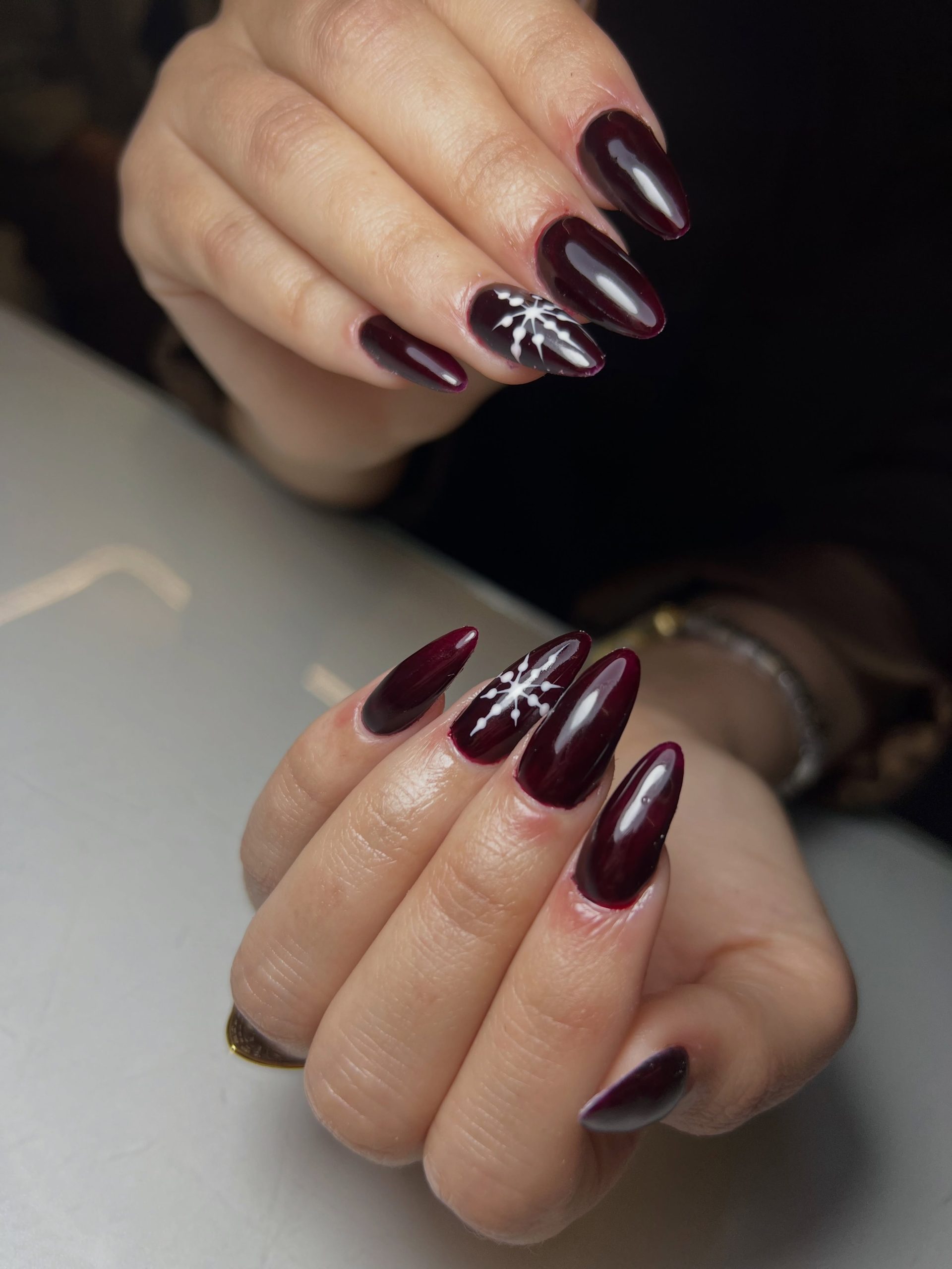 Deep Burgundy Snowflake Almond Nails