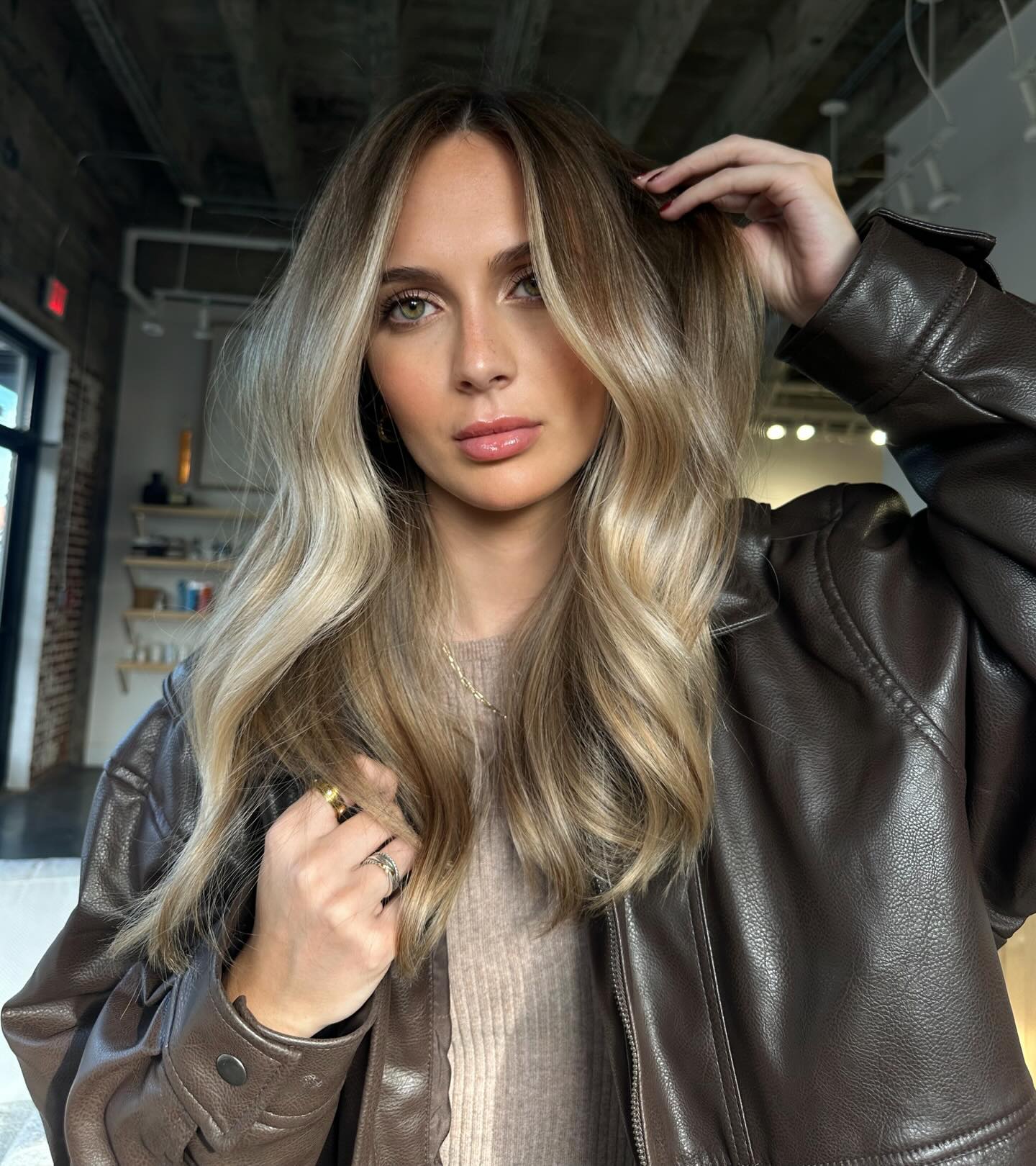 Dimensional Ash Blonde Waves With Face Framing