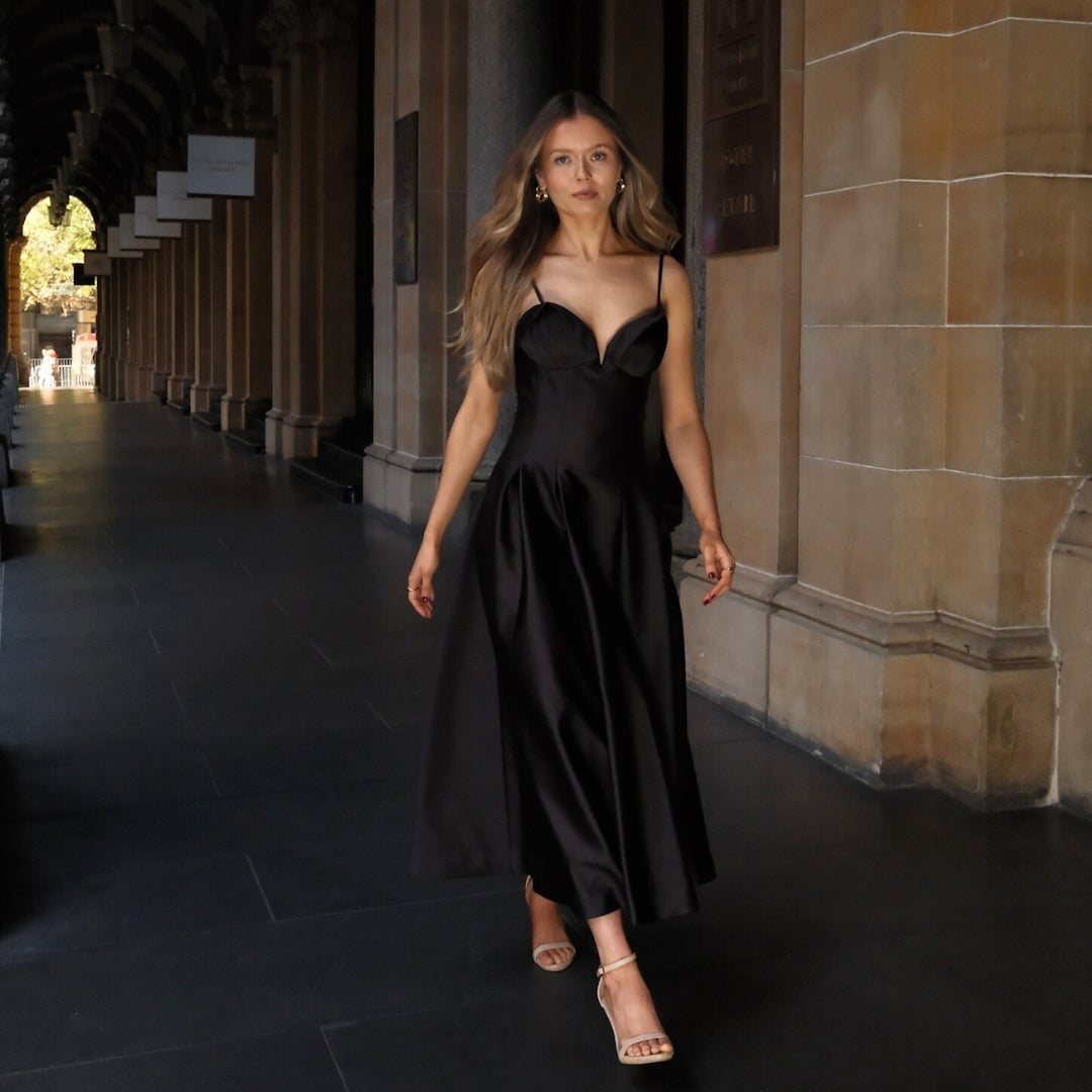 Black Fit-And-Flare Midi Dress in Satin With Beige Strappy Heels Black Fit-And-Flare Midi Dress in Satin With Beige Strappy Heels — Dinner Dress