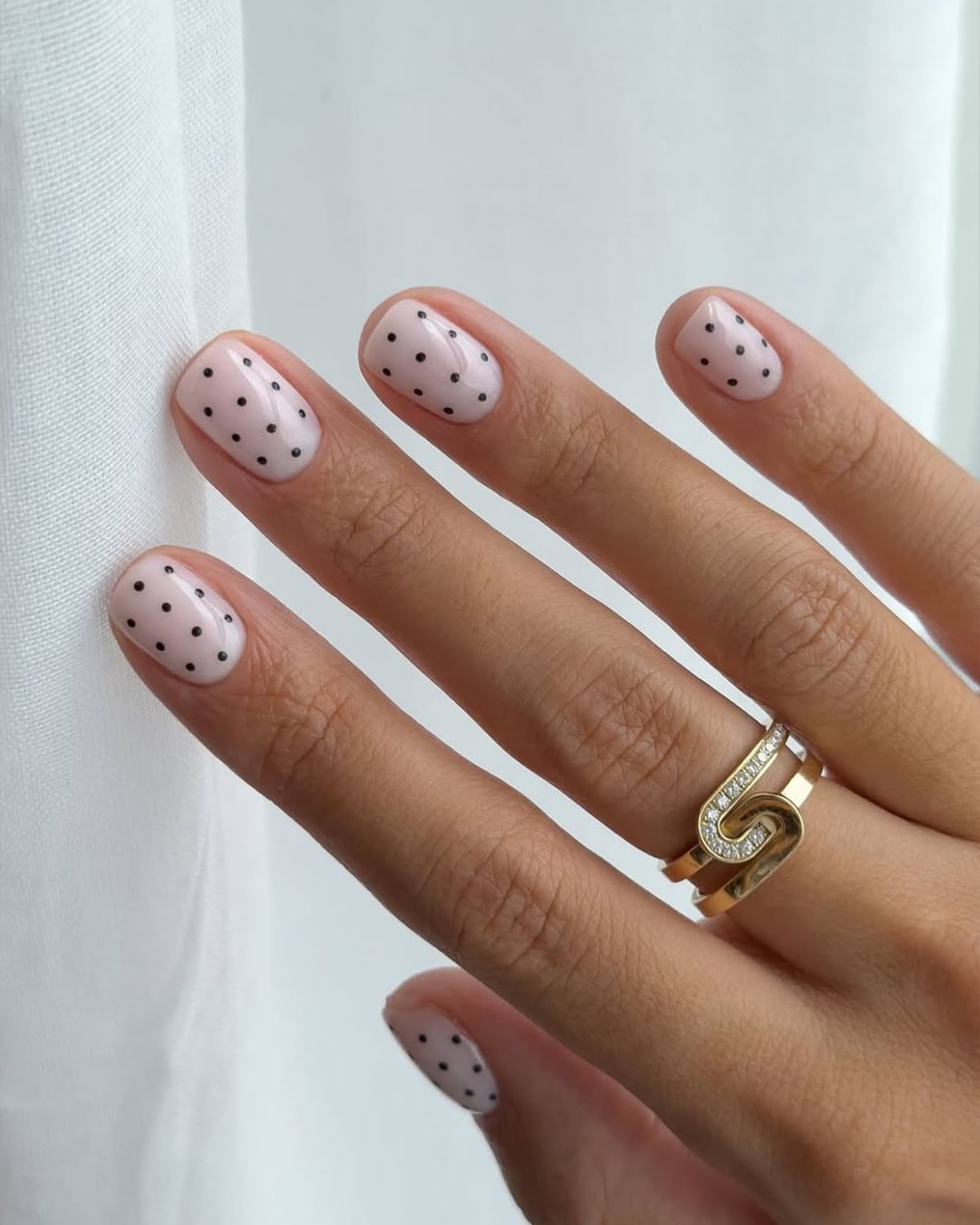 Short Almond Milky Pink Black Dot Nails — Dots Nail Designs