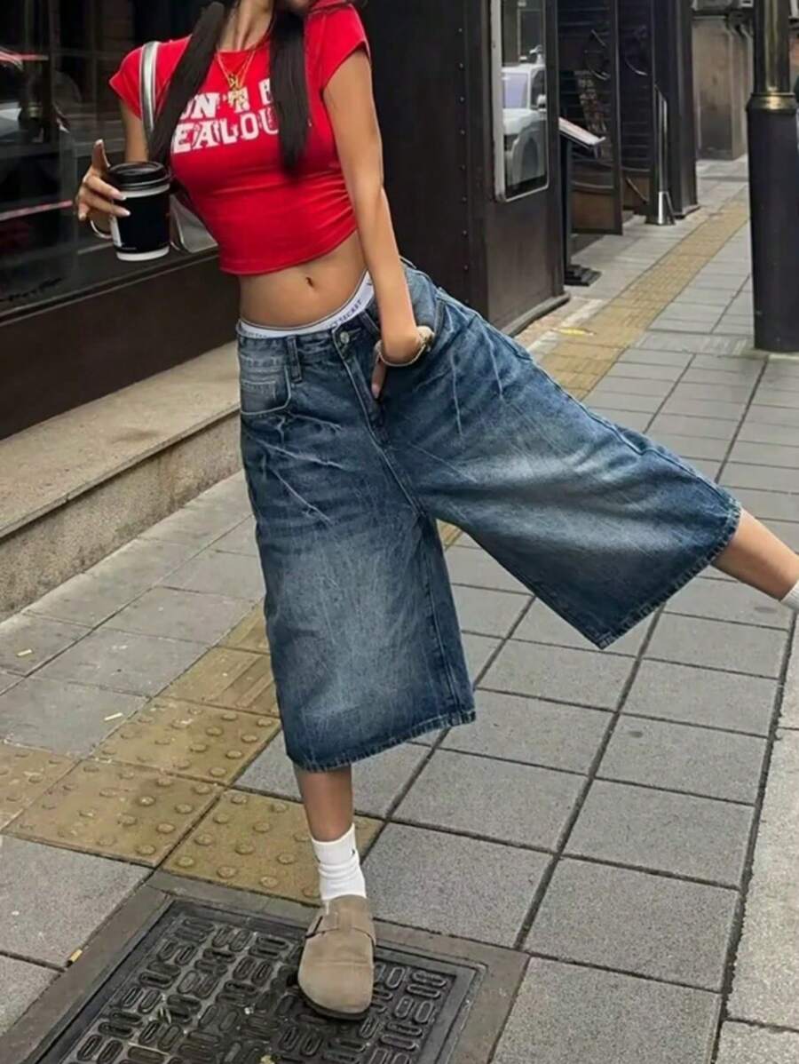 Graphic Crop Top with Flared Jeans — Downtown Girl Outfits