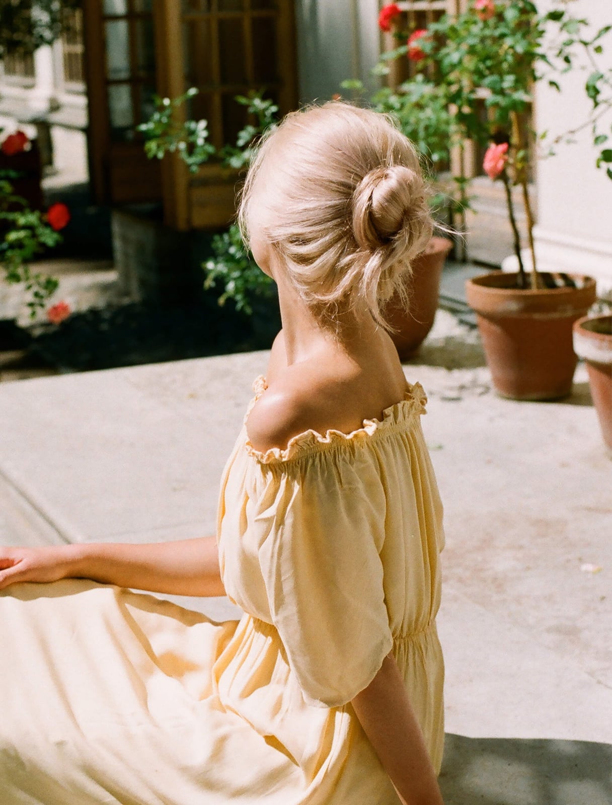 Blonde Low Bun With Face Framing Tendrils Blonde Low Bun With Face Framing Tendrils — Dresses Hairstyles