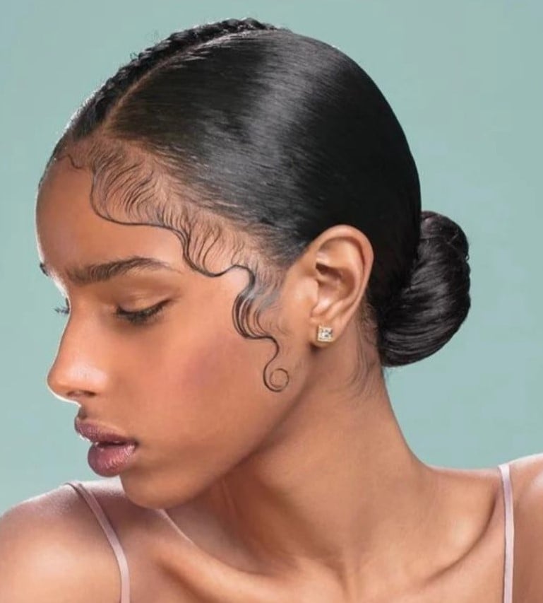 Sleek Low Bun With Sculpted Swirl Edges Sleek Low Bun With Sculpted Swirl Edges — Edges Hairstyles