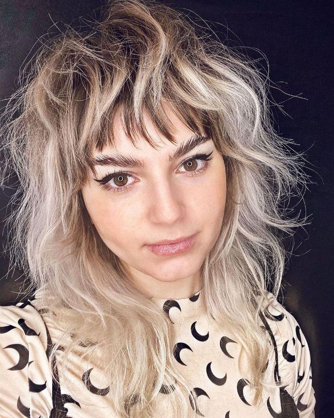 Shaggy Blonde Mullet With Choppy Bangs Shaggy Blonde Mullet With Choppy Bangs — Edgy Haircuts