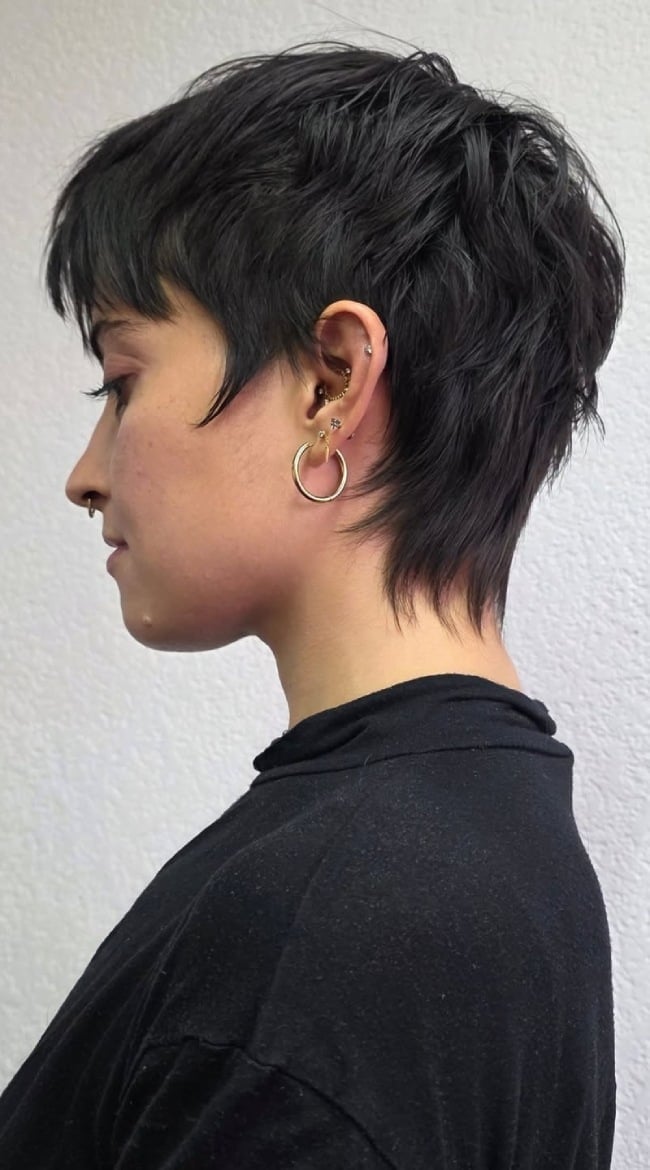 Textured Black Pixie Mullet With Wispy Bangs Textured Black Pixie Mullet With Wispy Bangs — Edgy Haircuts