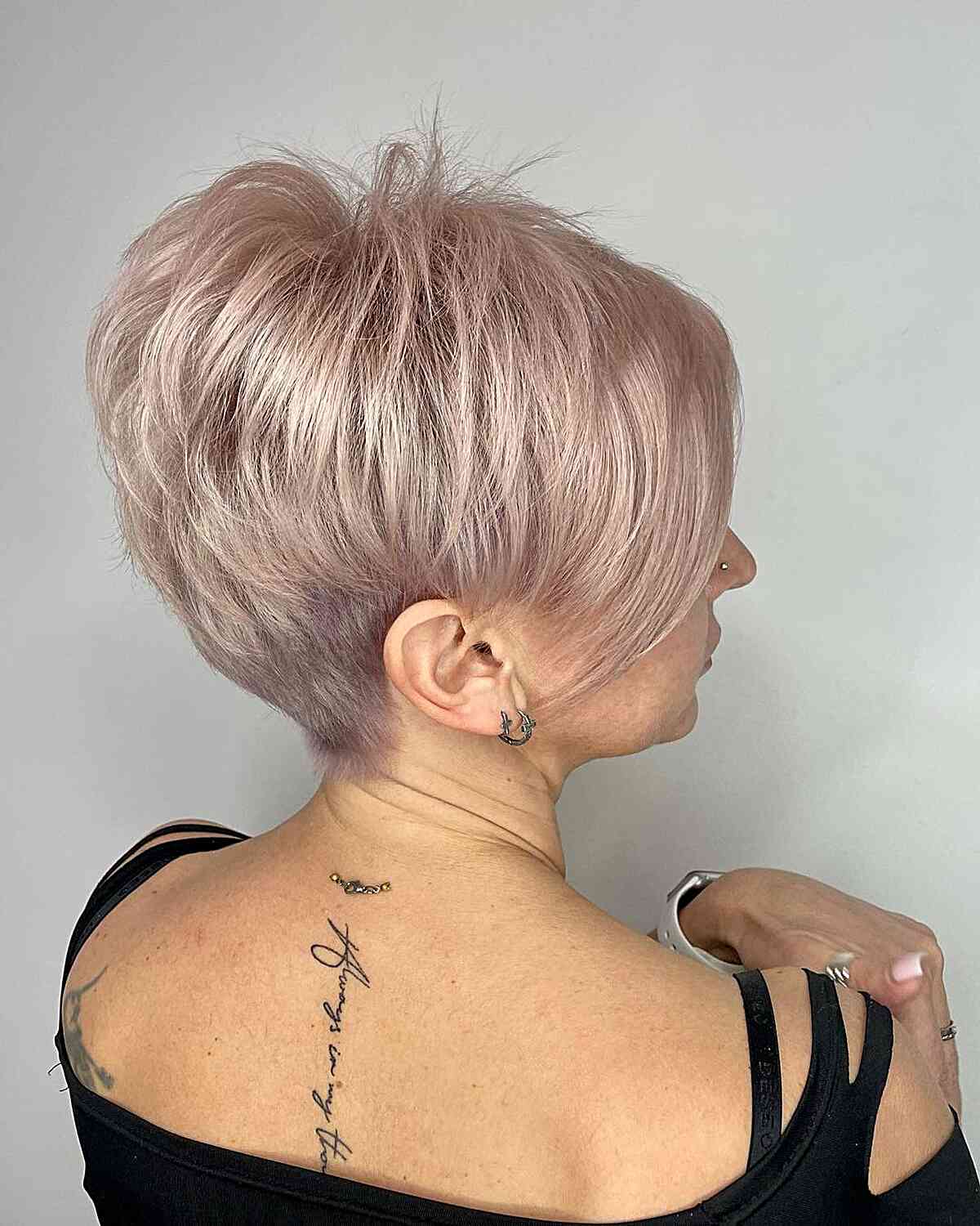 Pink Blonde Pixie With Textured Swept Style Pink Blonde Pixie With Textured Swept Style — Edgy Haircuts