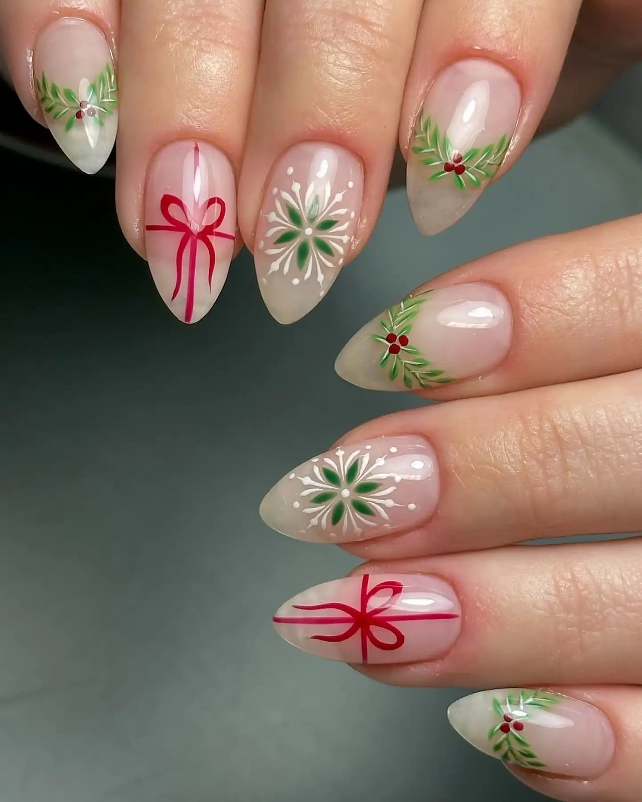 Almond Nails With Red Bows And Snowflakes Almond Nails With Red Bows And Snowflakes — Elegant Christmas Nails