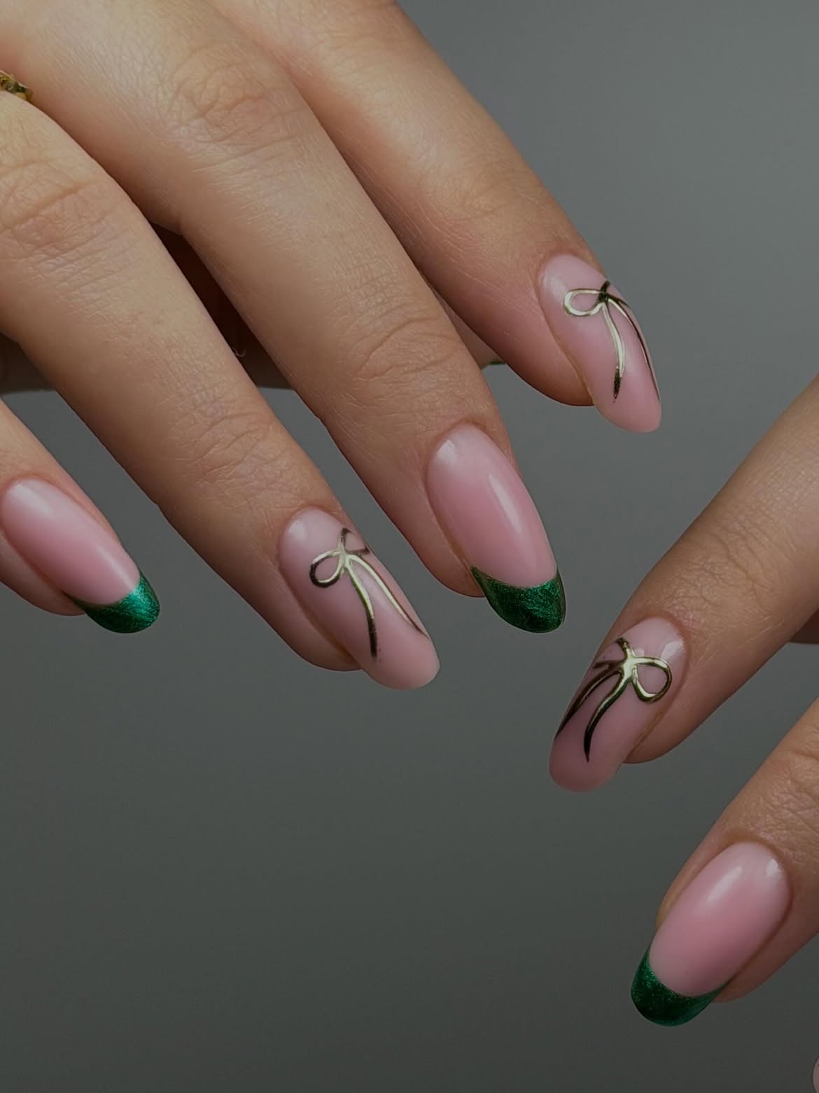 Elegant Emerald French Bow Accent Nails