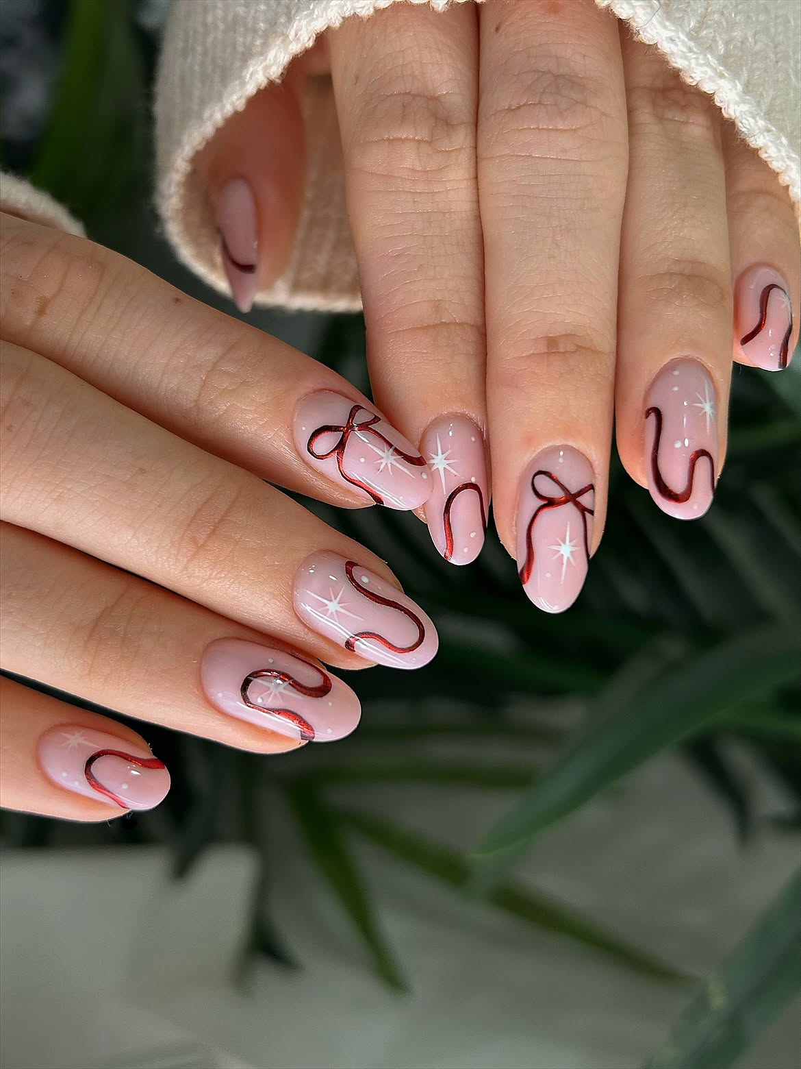 Elegant Ribbon and Star Christmas Oval Nails