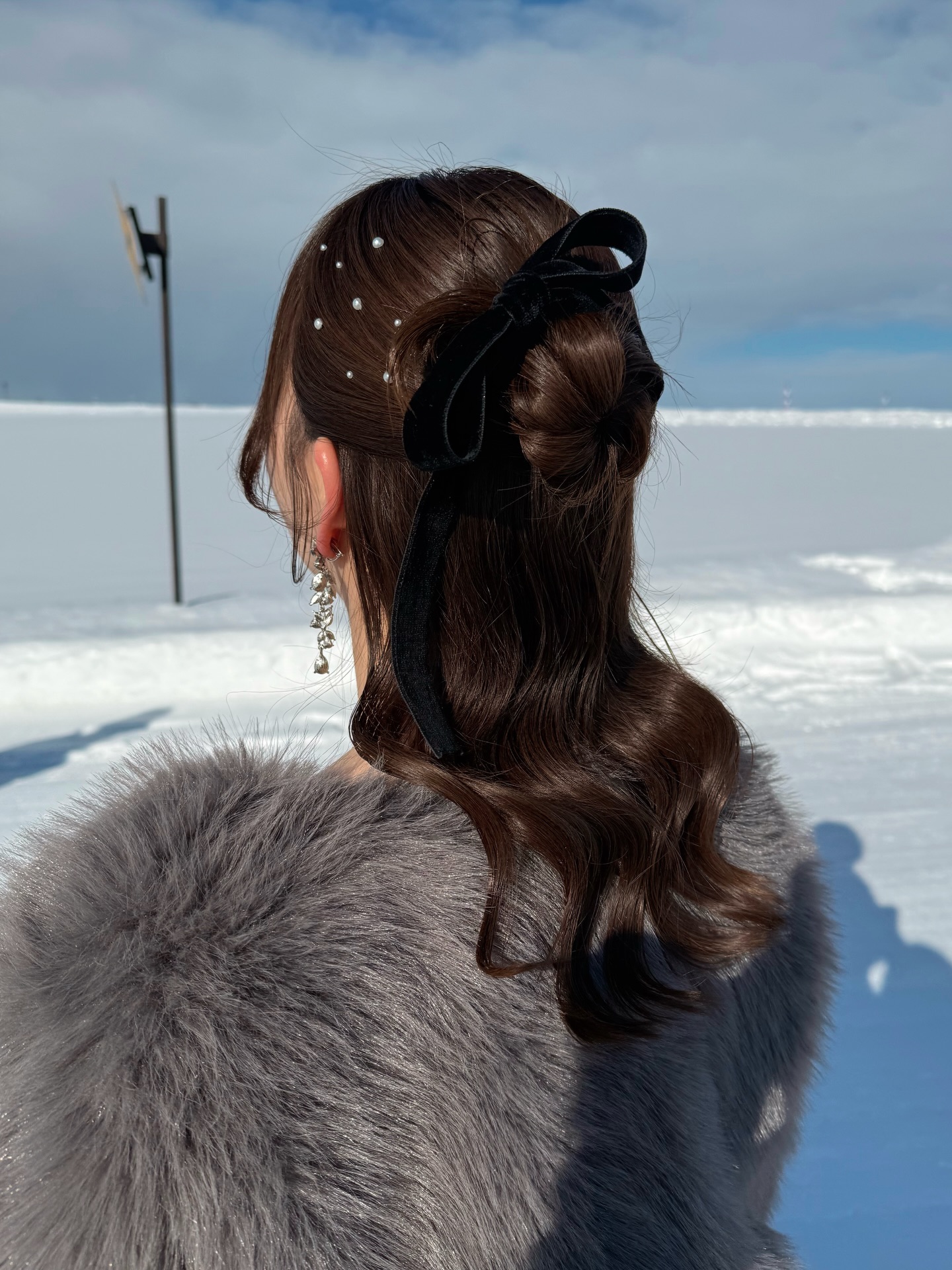 Elegant Velvet Bow Updo With Pearl Accents