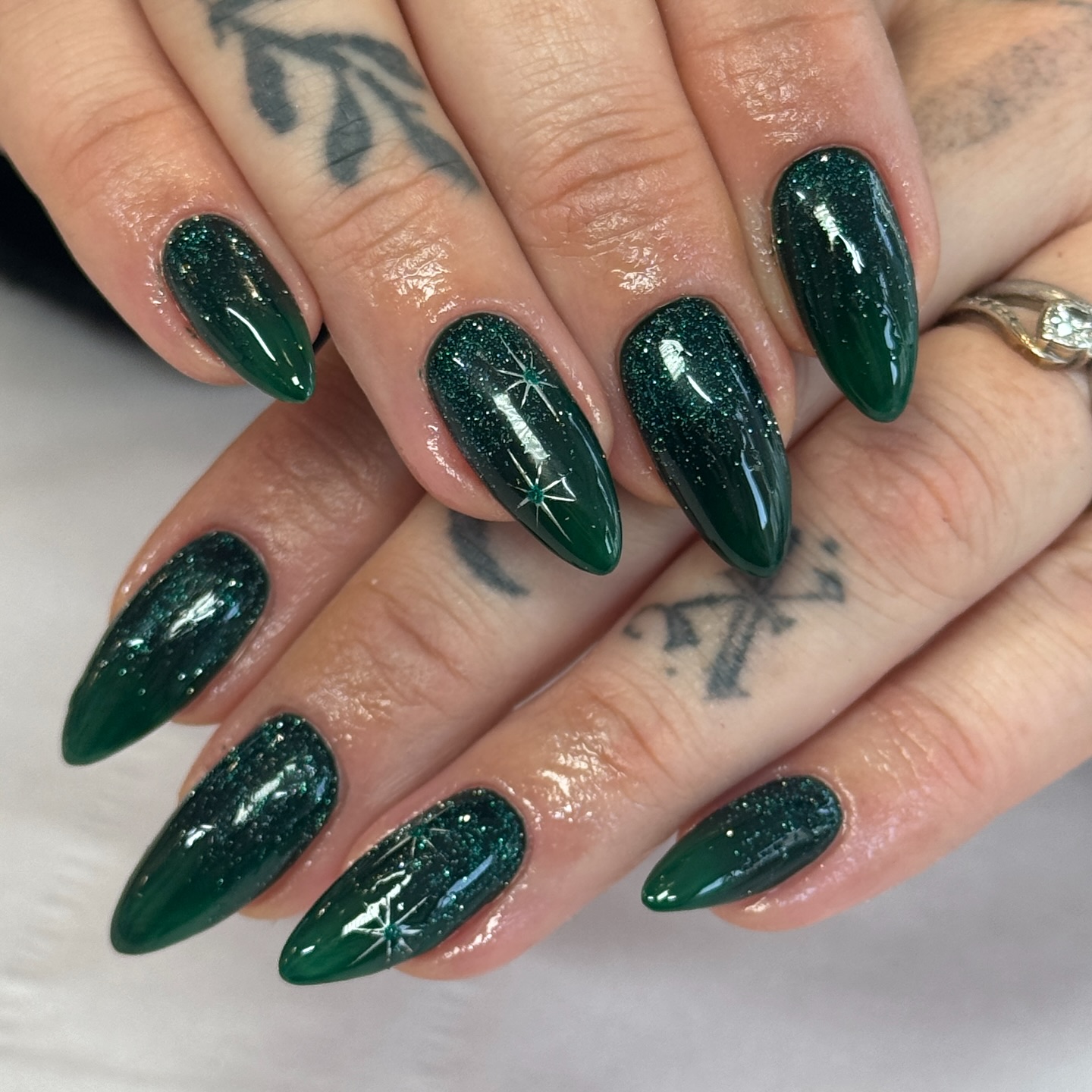 Emerald Glitter Ombre Almond Nails