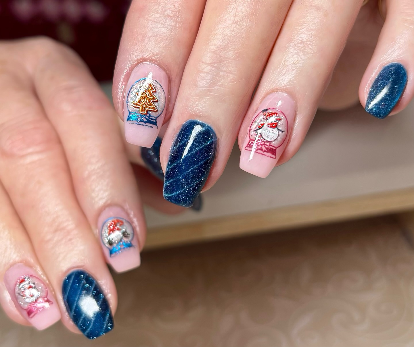 Enchanting Snow Globe Christmas Nail Art