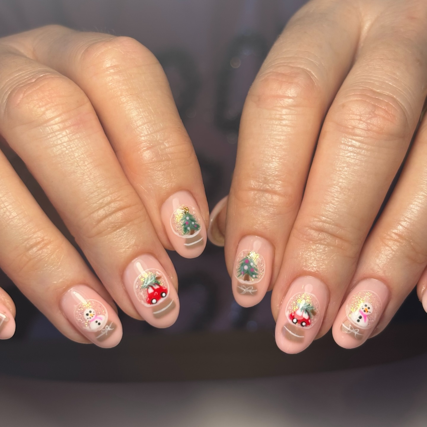 Enchanting Snow Globe Christmas Nail Art