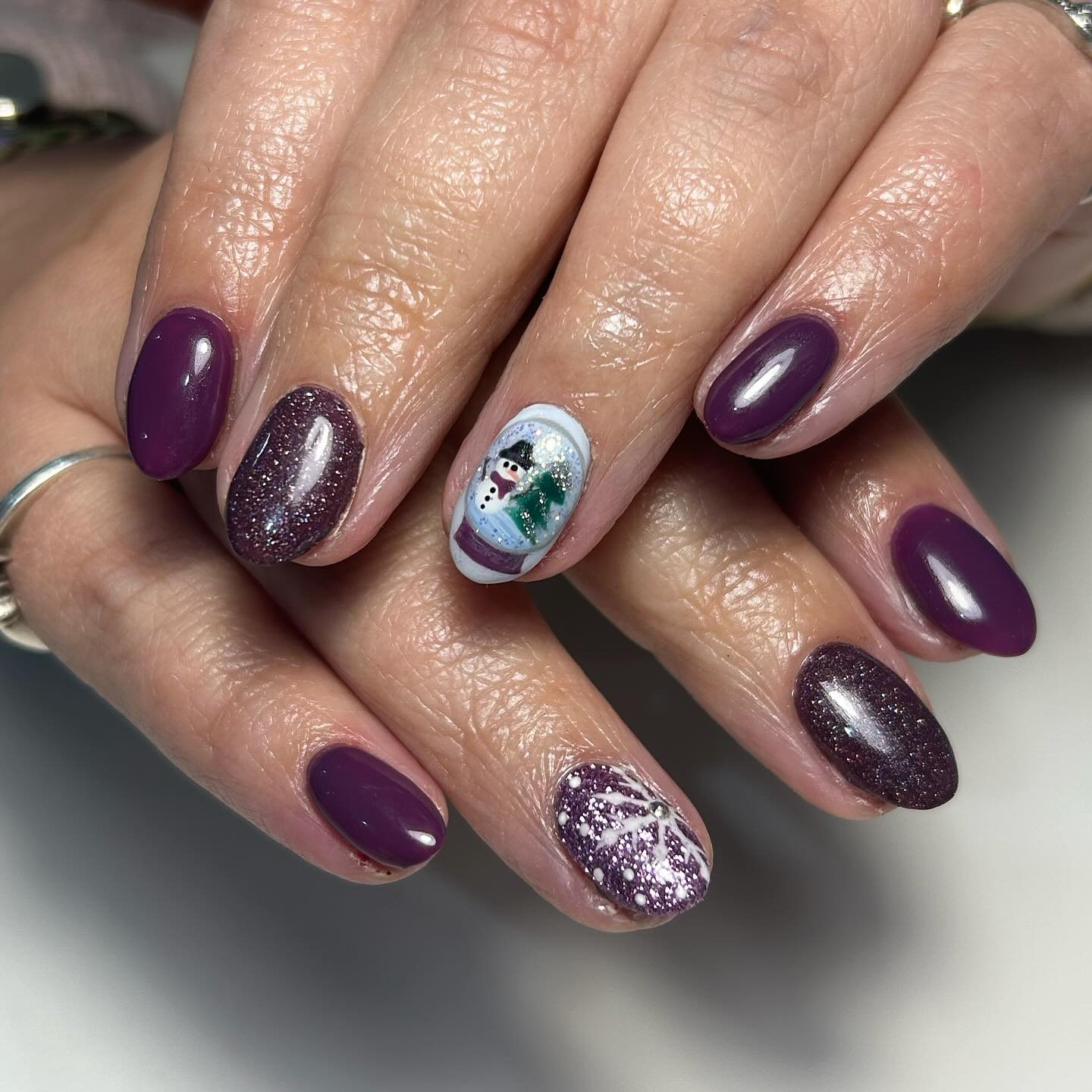 Enchanting Snow Globe Oval Nails
