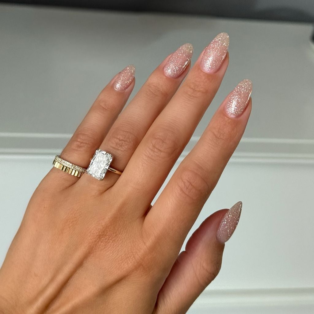 Sheer Nude Glitter Glossy Medium Almond Nails, Close-Up Take Sheer Nude Glitter Glossy Medium Almond Nails, Close-Up Take — Engagement Nails