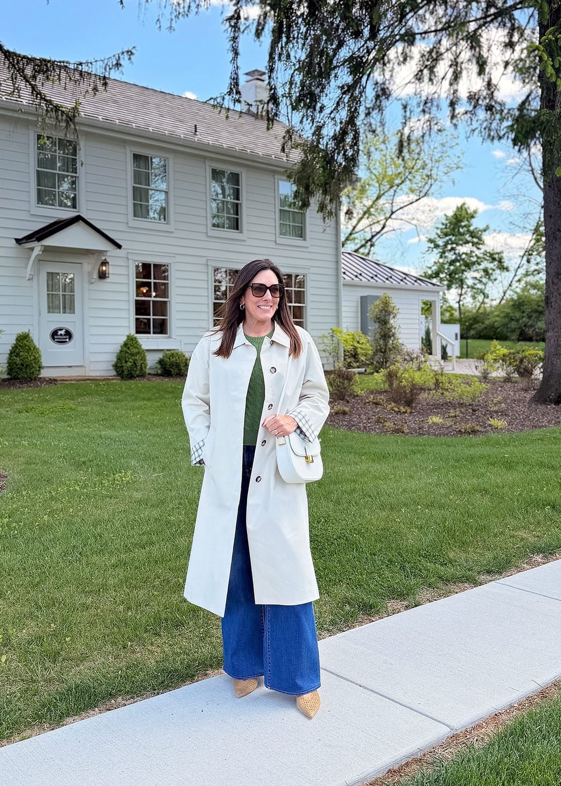 White Trench Coat With Green Sweater And Blue Jeans — Errands Outfits