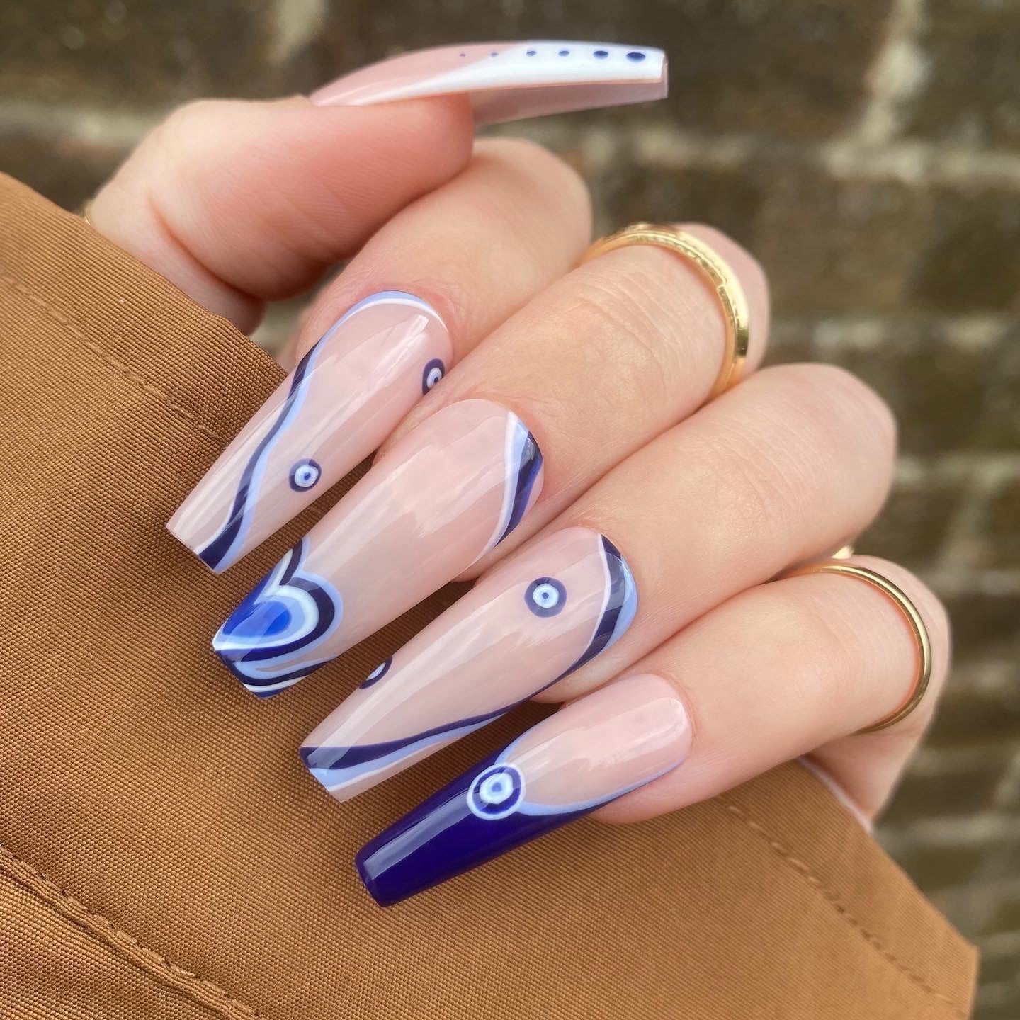 Long Coffin Nails Blue Evil Eye Pattern, Close-Up Take Long Coffin Nails Blue Evil Eye Pattern, Close-Up Take — Evil Eye Nails
