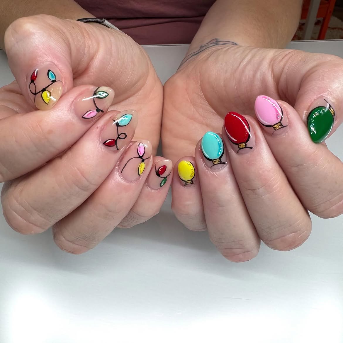 Festive Christmas Lights Almond Nails