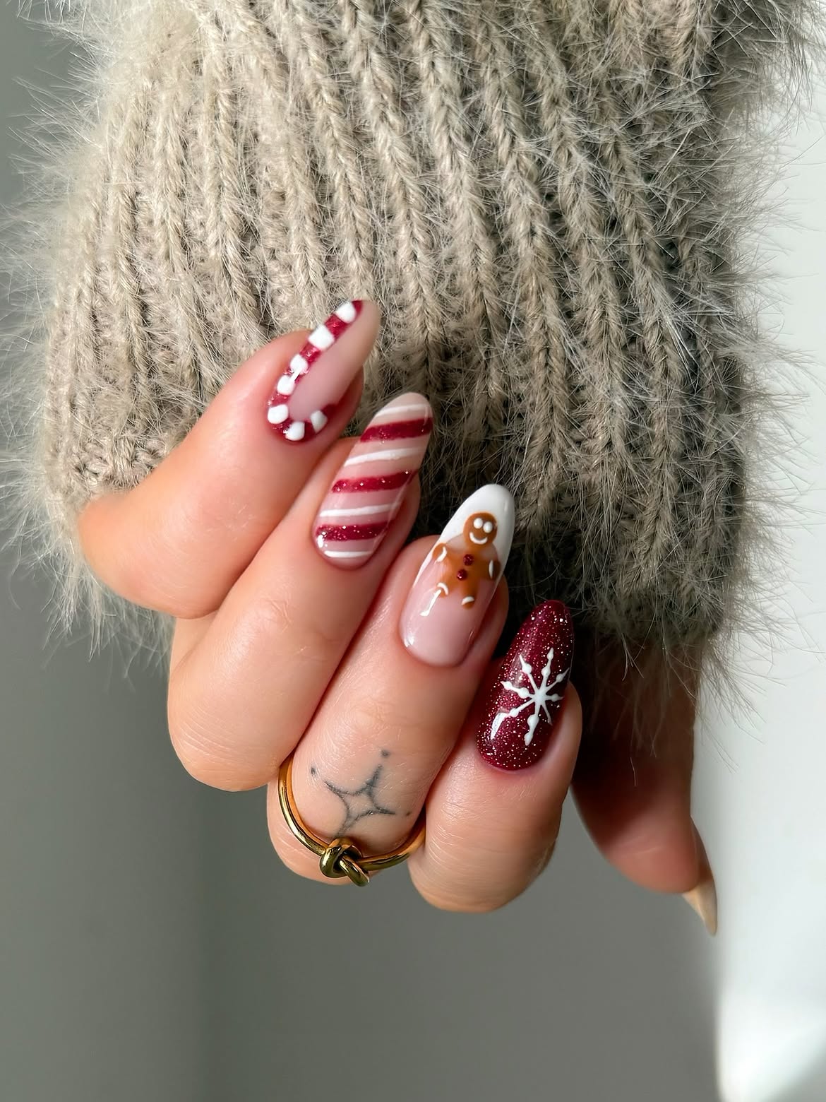 Festive Gingerbread Man and Snowflake Almond Nails