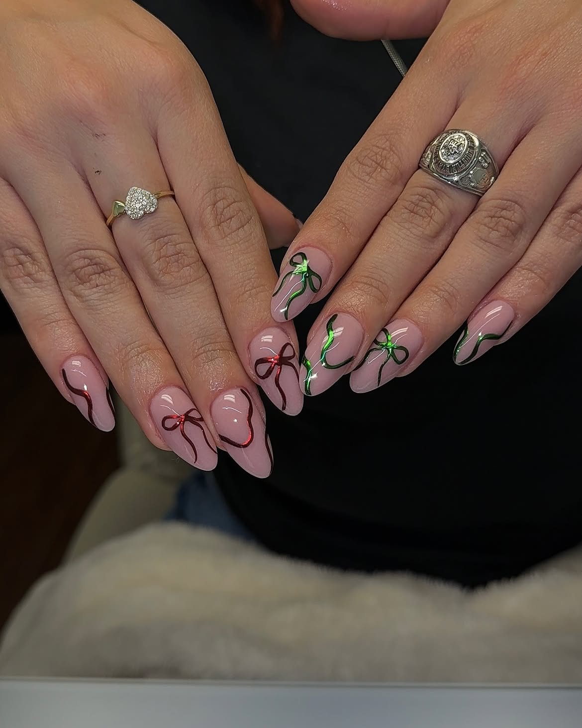 Festive Red and Green Bow Almond Nails
