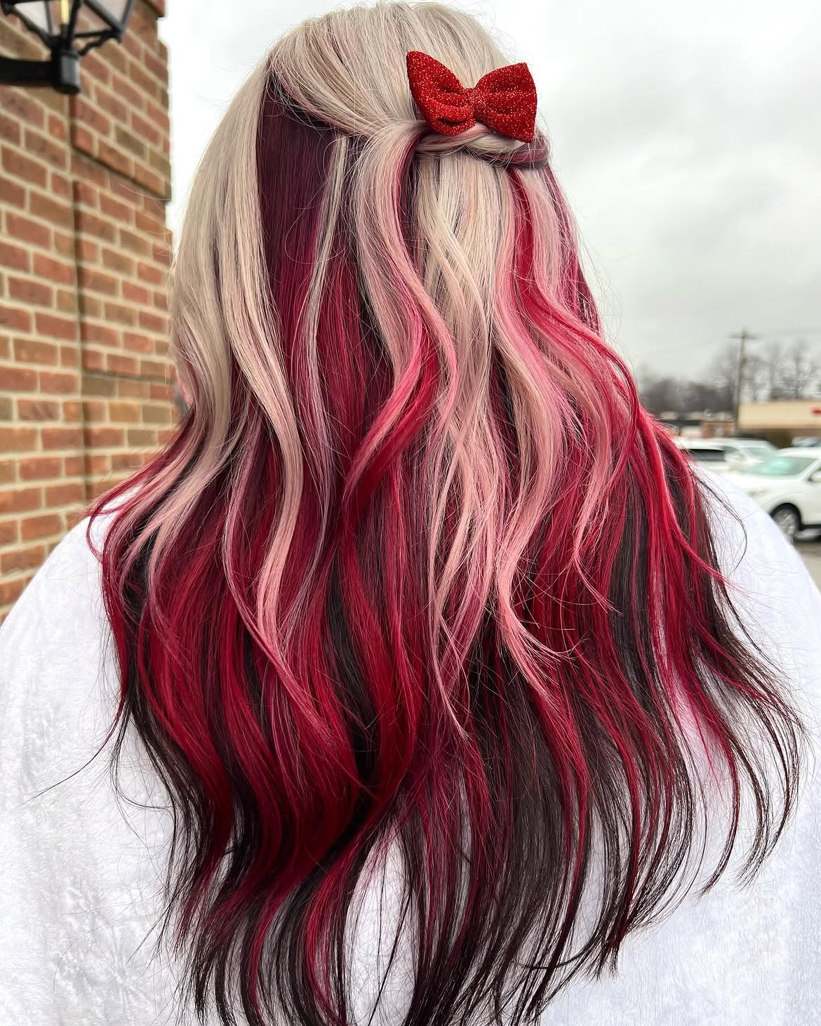 Festive Red And Platinum Peekaboo Holiday Curls