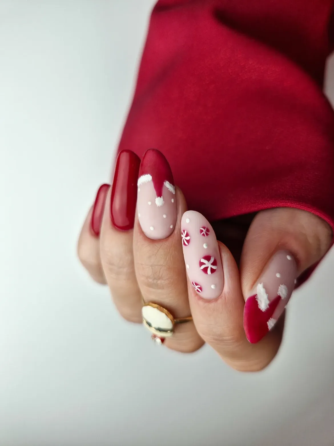 Festive Red And White Candy Cane Christmas Almond Nails