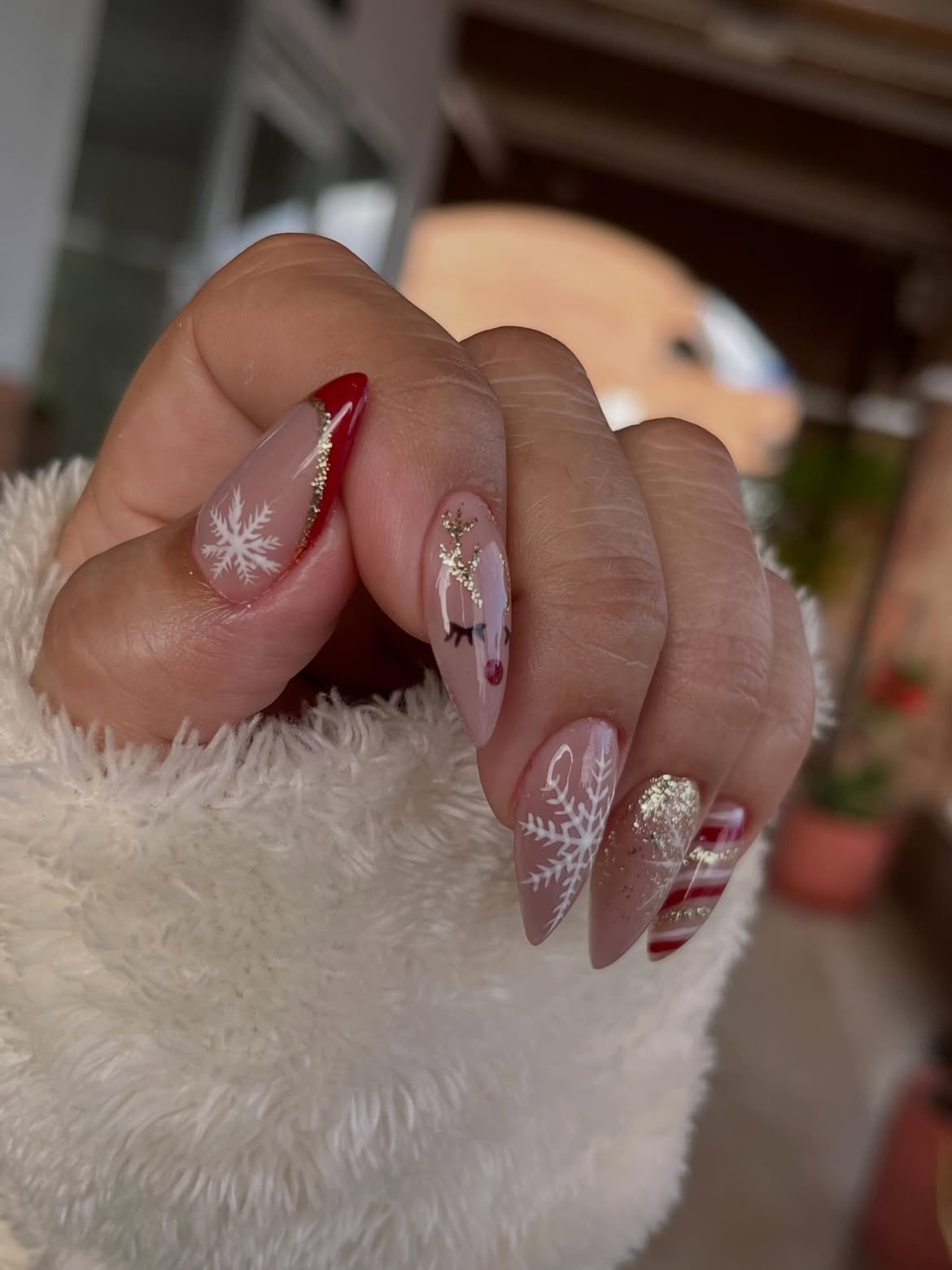 Festive Red And White Snowflake Almond Nails