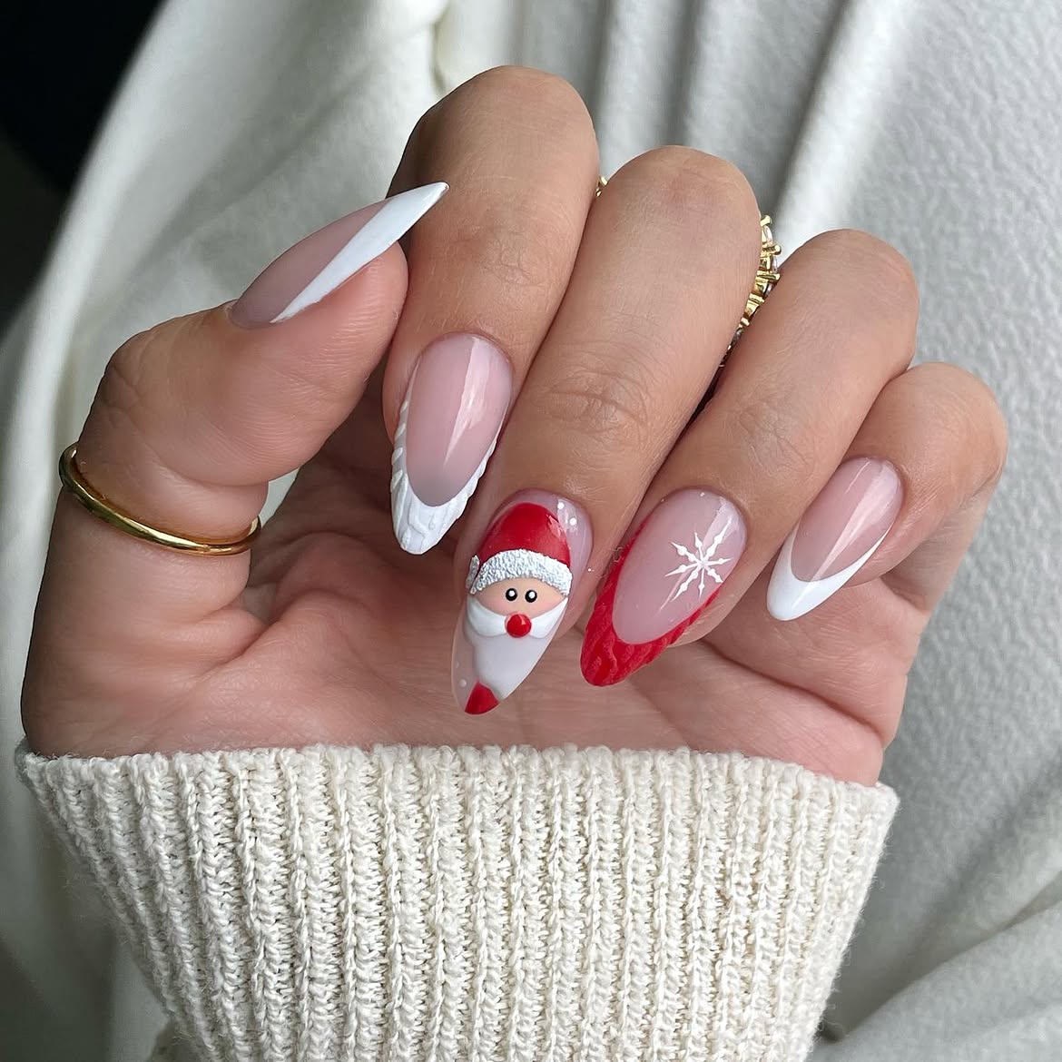 Festive Santa And Snowflake Almond Christmas Nails