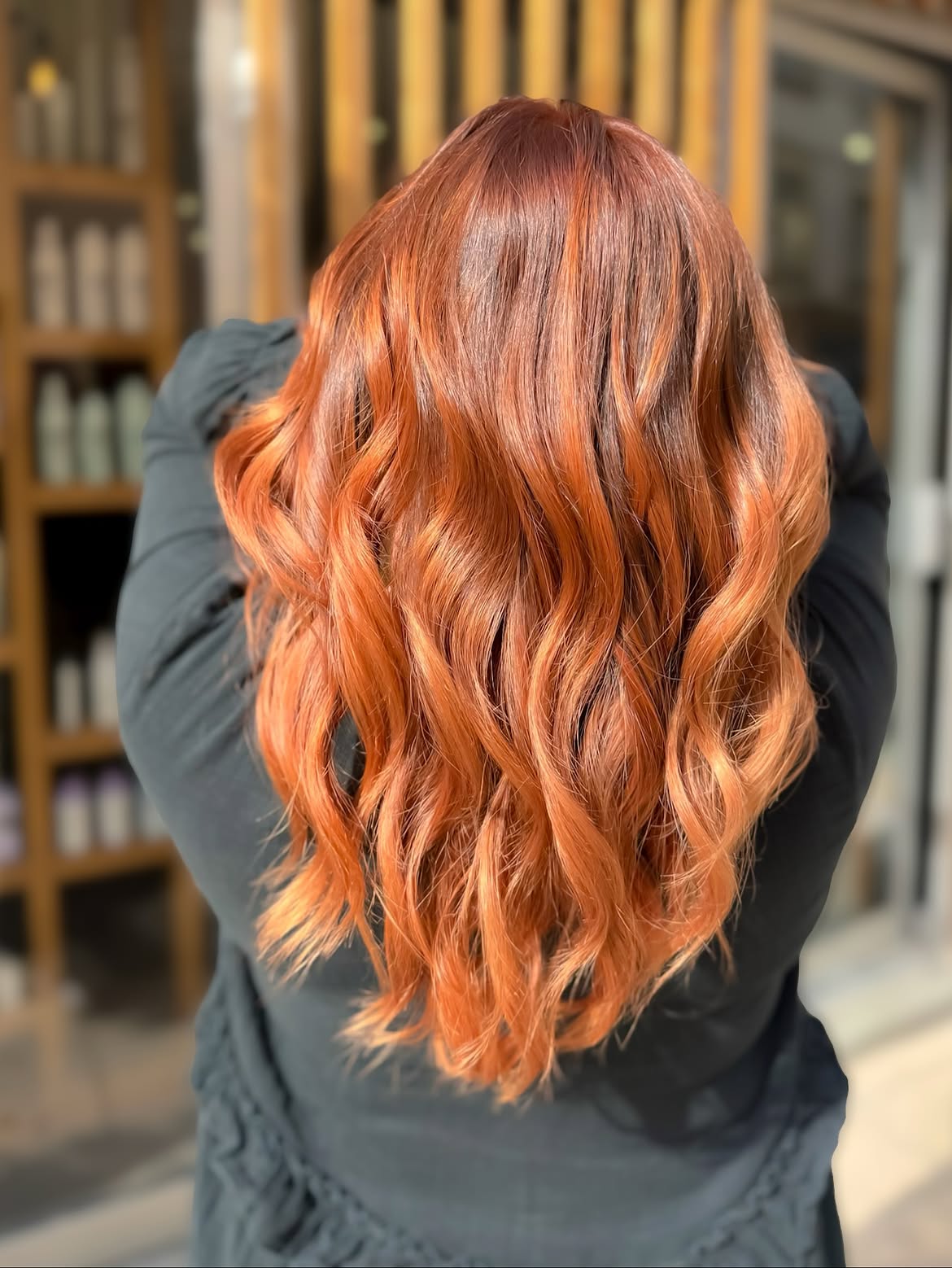 Fiery Copper Waves With Face-Framing Layers