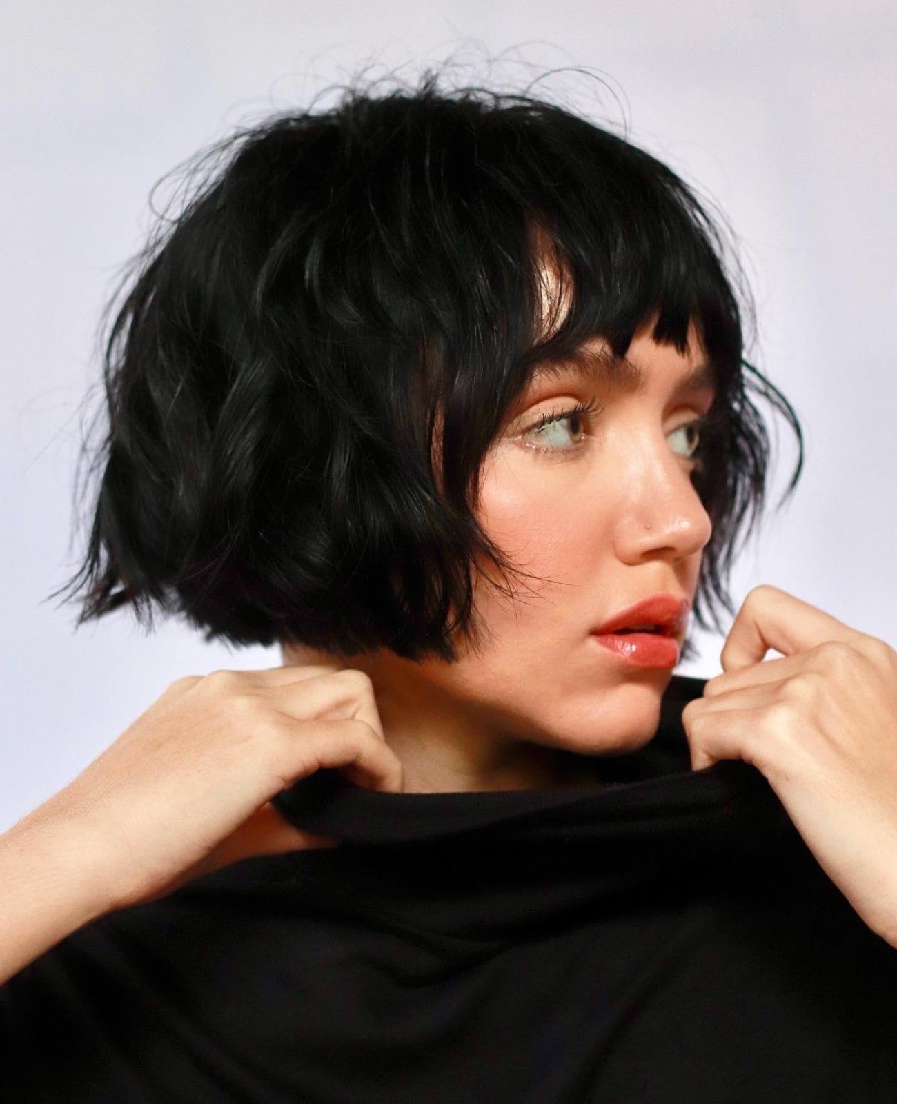 Wavy Black Bob With Wispy Bangs — French Bob