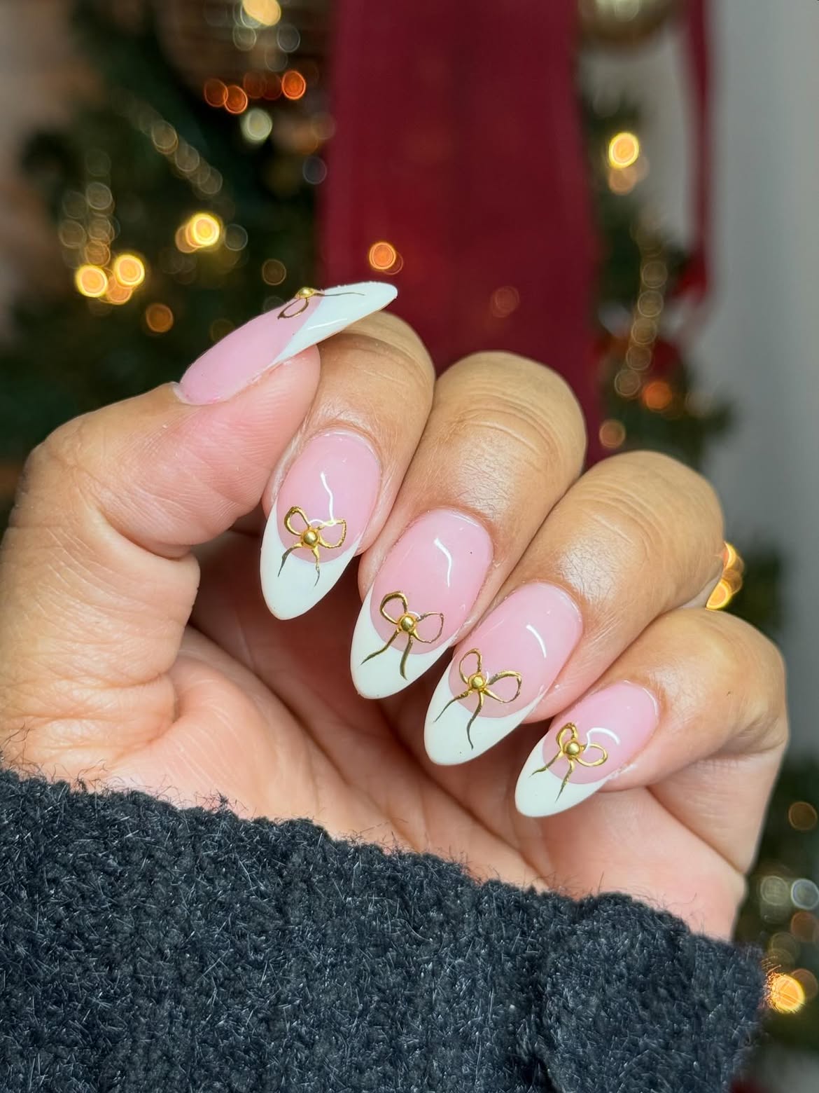 French Tip Nails with Gold Bow Accents
