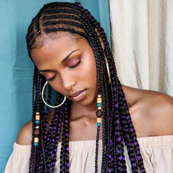 Mid-Back Fulani Braids with Purple Highlights Mid-Back Fulani Braids with Purple Highlights